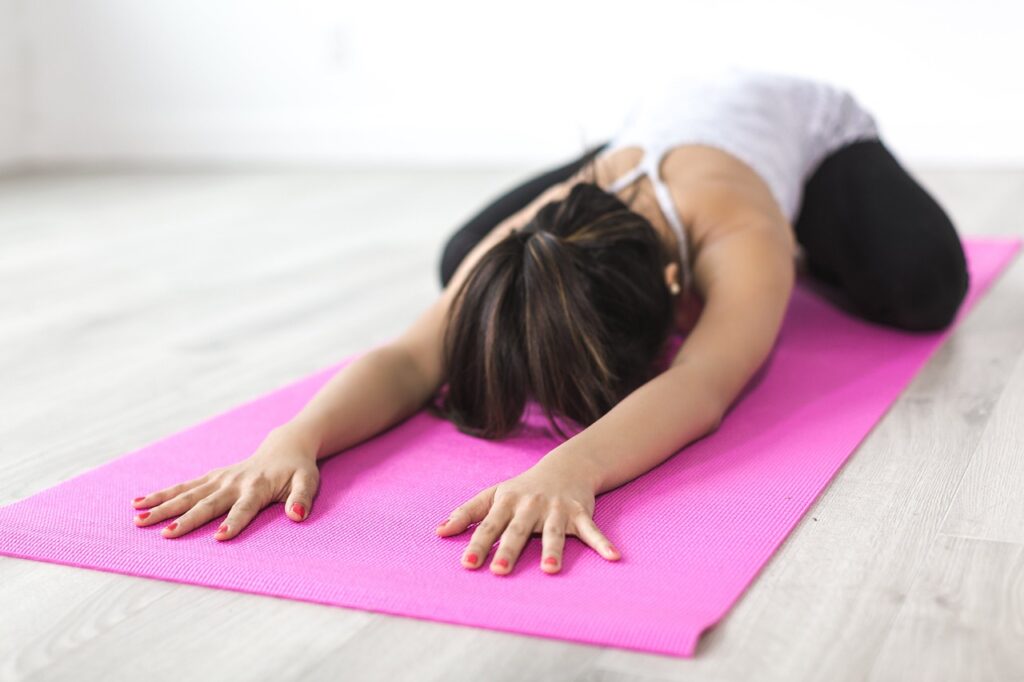 Yoga on pink mat