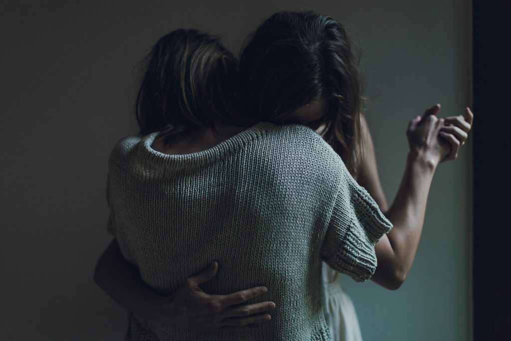 Two women providing emotional support